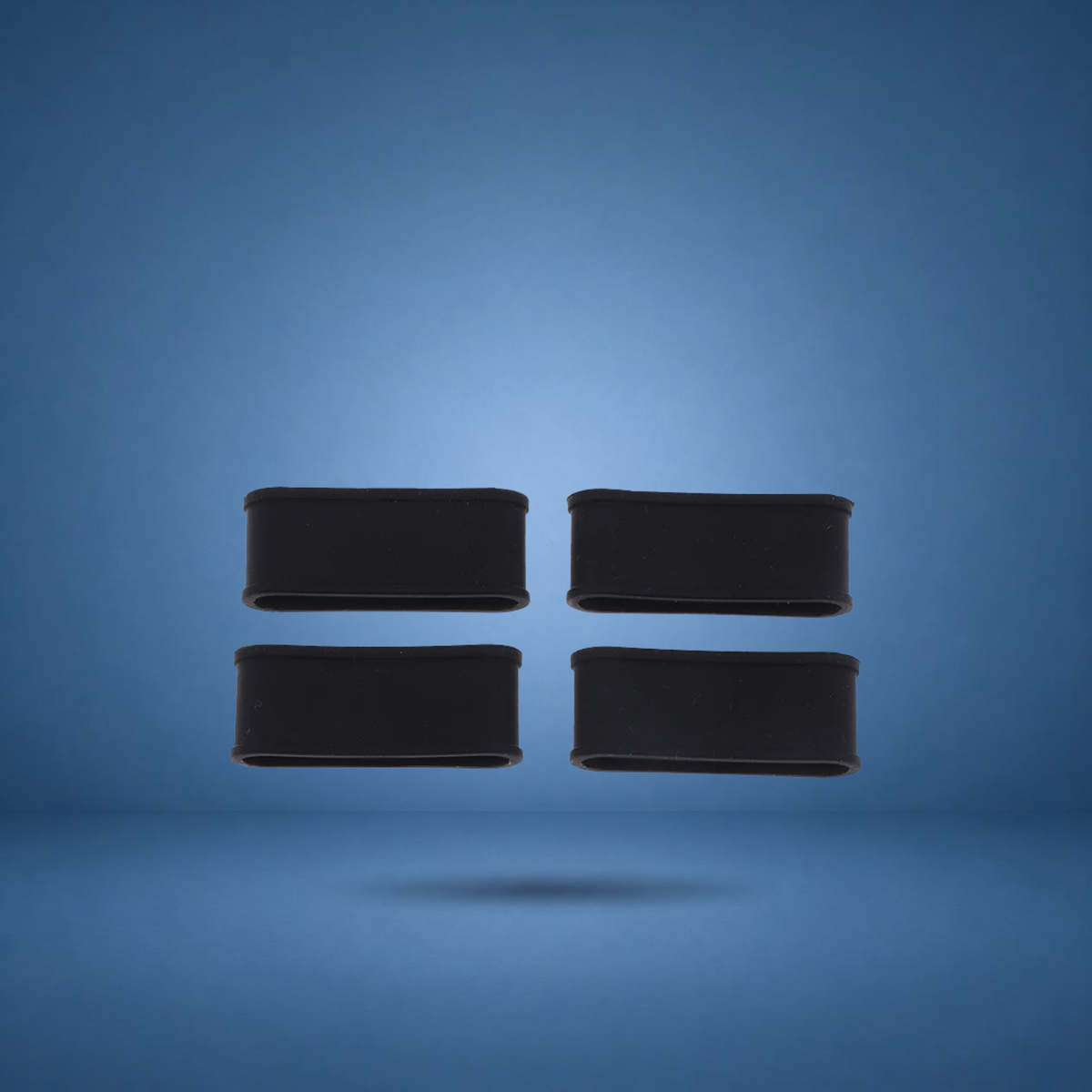 Anneaux de manche en silicone noirs, lot de 4, visuel studio sur fond bleu terrain