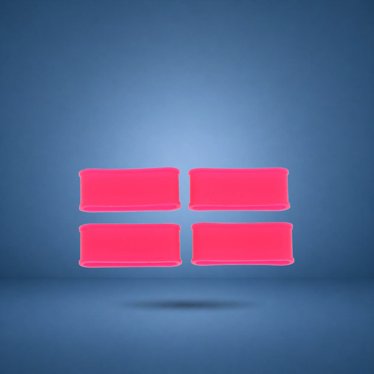 Anneaux de manche en silicone rose vif, lot de 4, visuel studio sur fond bleu terrain
